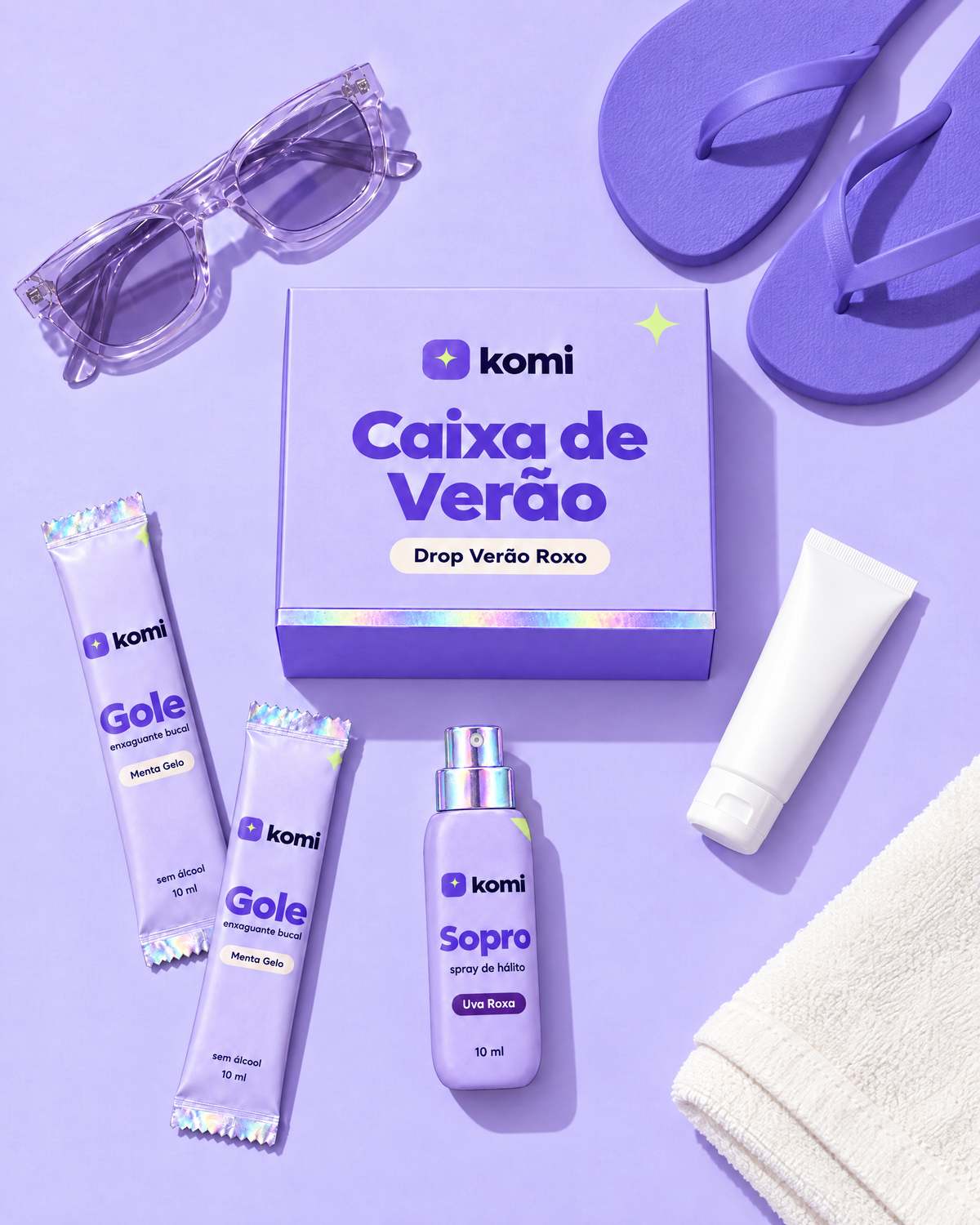 Caixa de Verão com Goles e Sopro num flatlay de praia